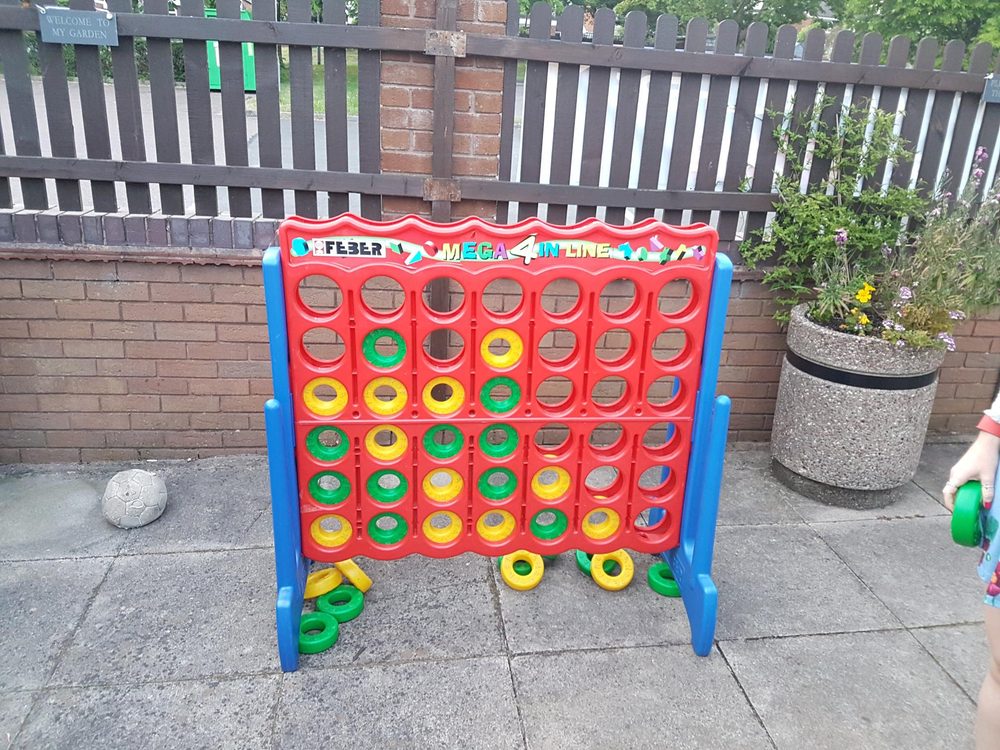 Giant Connect Four game set up in the beer garden for a fun summer evening